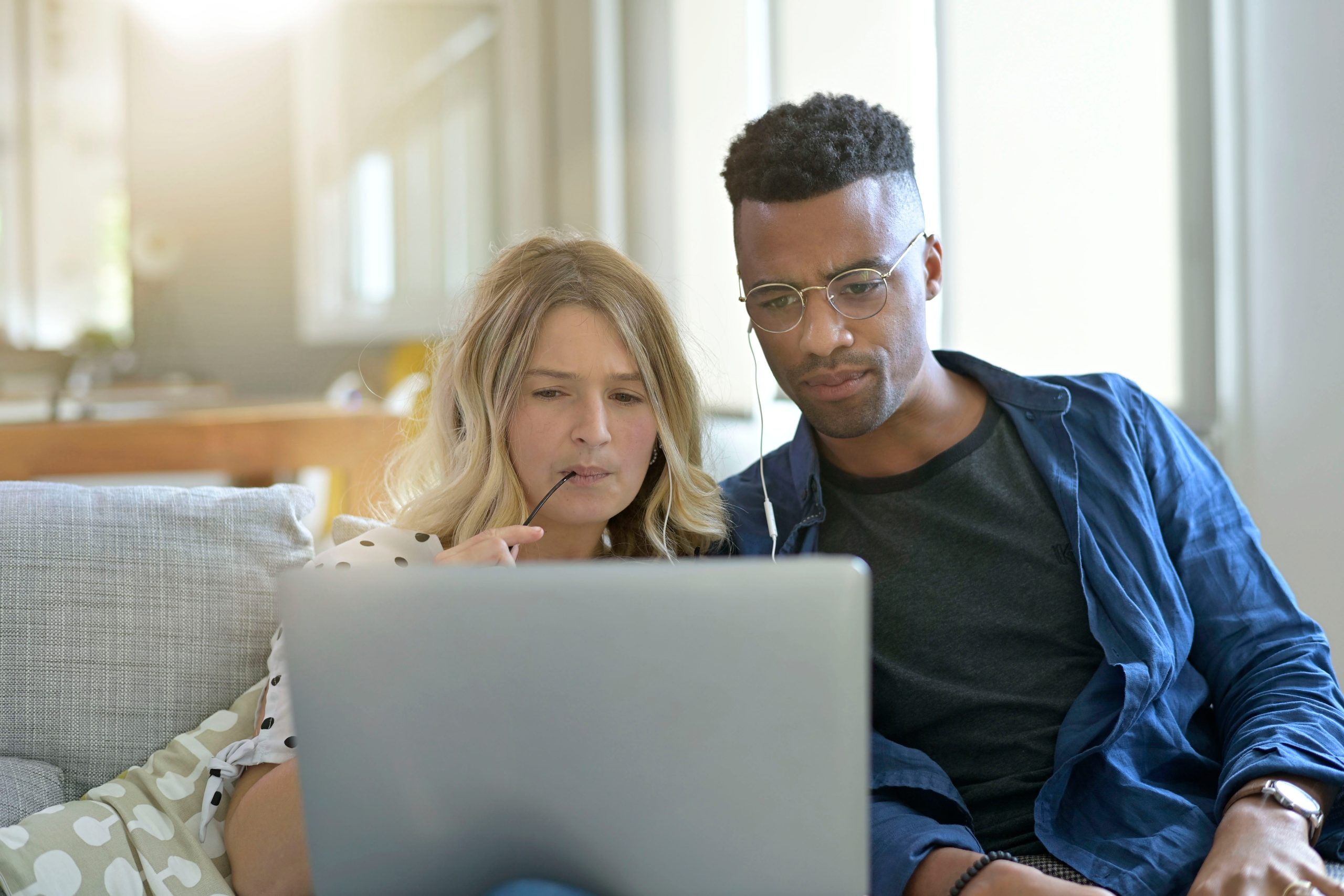 Married couple comparing services offered by home care agencies.